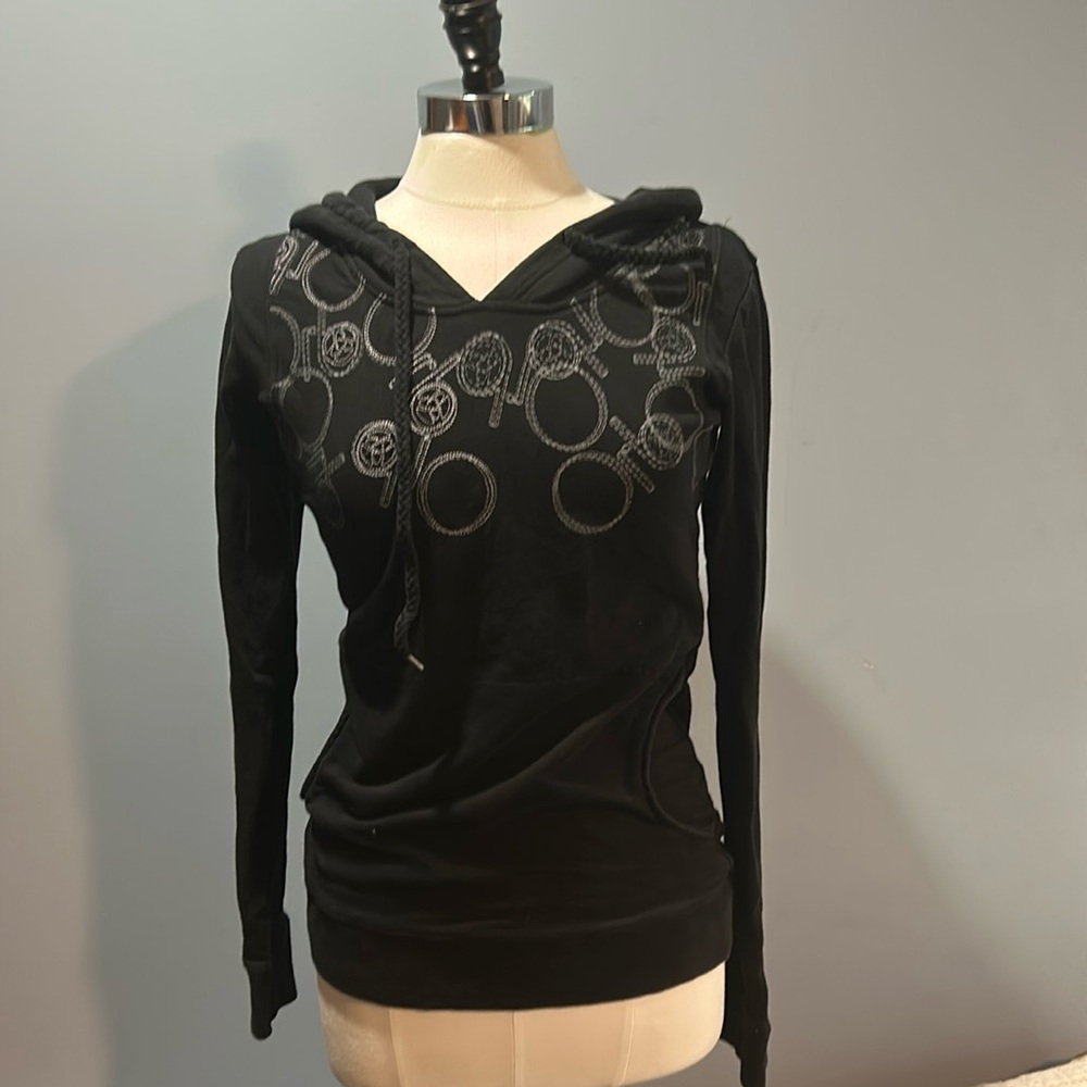 Women’s ORB black pullover hoodie.